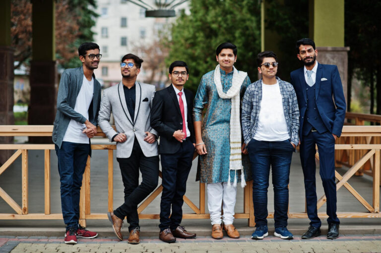 a group of males in Asian Suits and Western Suits