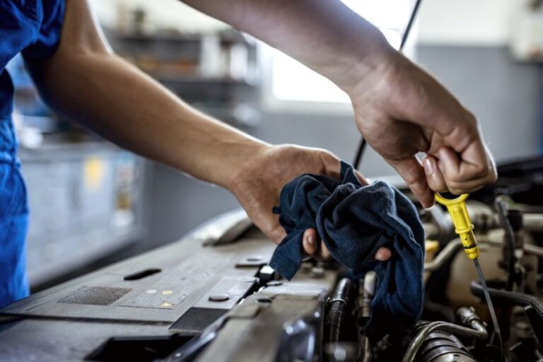 Mechanic doing fuel cleaning service​